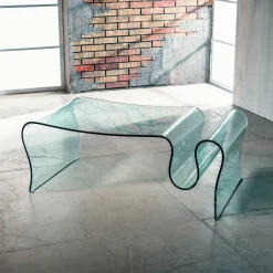 Tavolino in vetro curvato Ralf con portariviste 110 x 60 cm