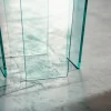 Tavolino lato divano in vetro curvato Morley