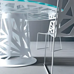 Tavolo rotondo in vetro e metallo Domino